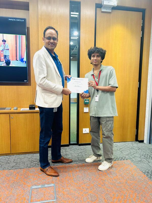 Receiving the TIAA hackathon certificate